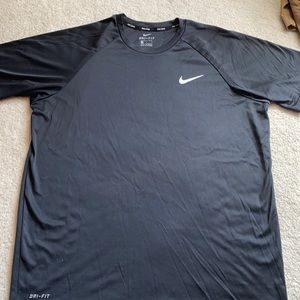 Men’s large Nike swim DRI-FIT black shirt. Like new.